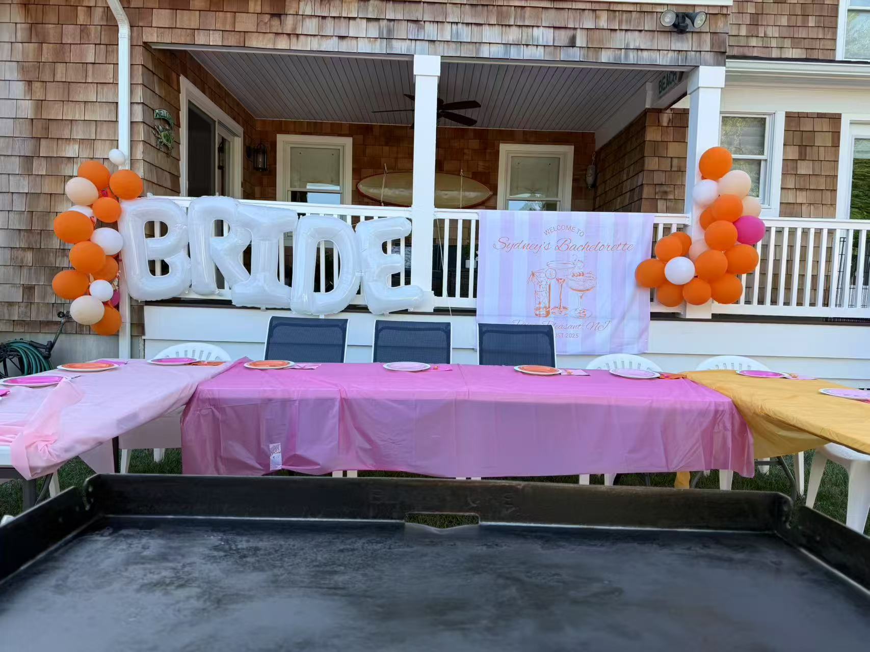 Bachelorette hibachi party setup with BRIDE balloons